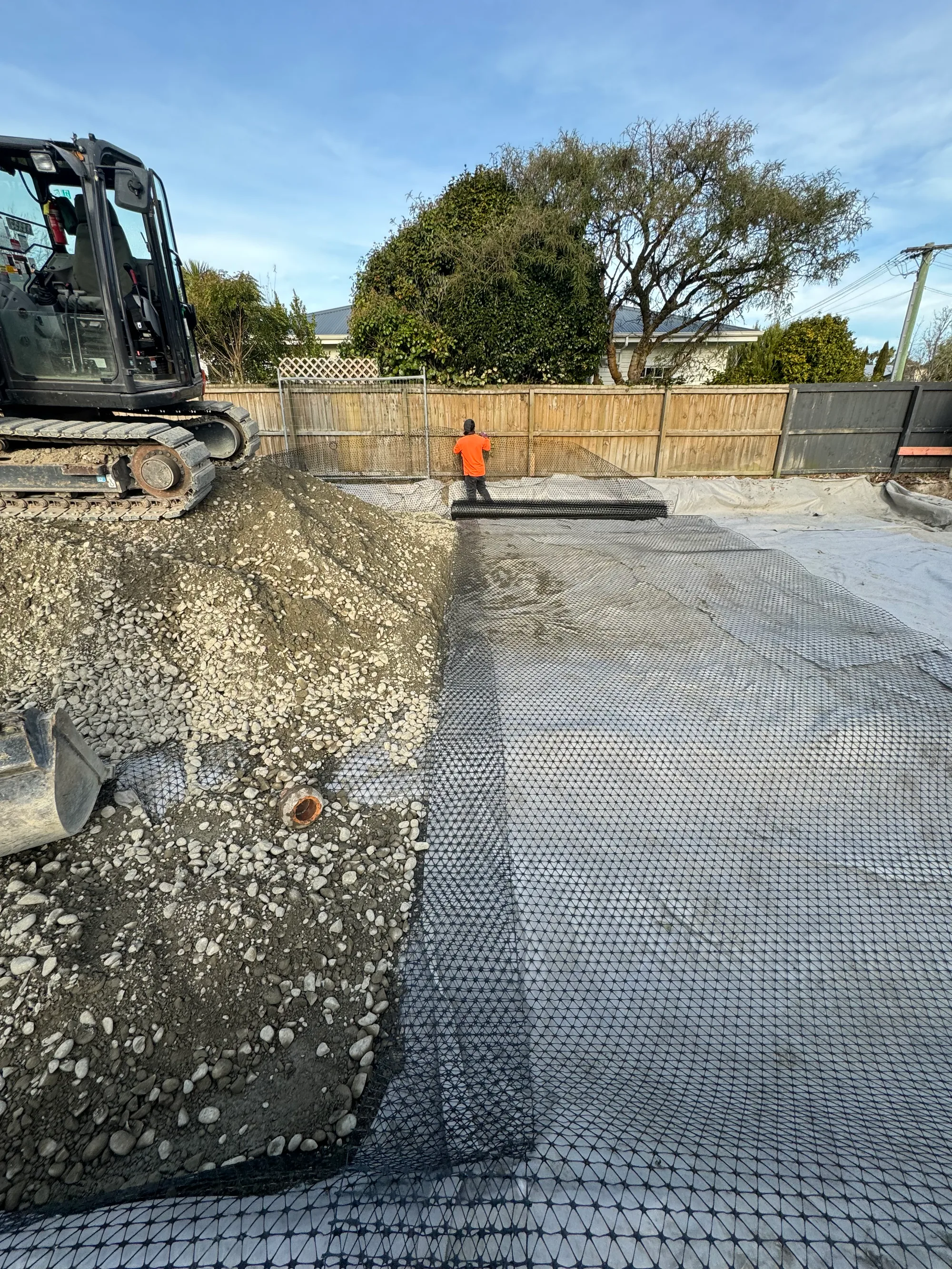 Mini excavator working on Christchurch residential site