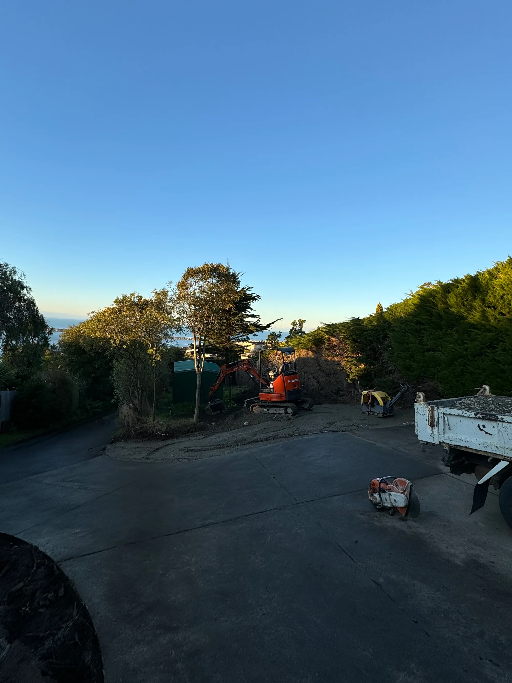 Mini excavator on residential landscaping site, Christchurch digger hire